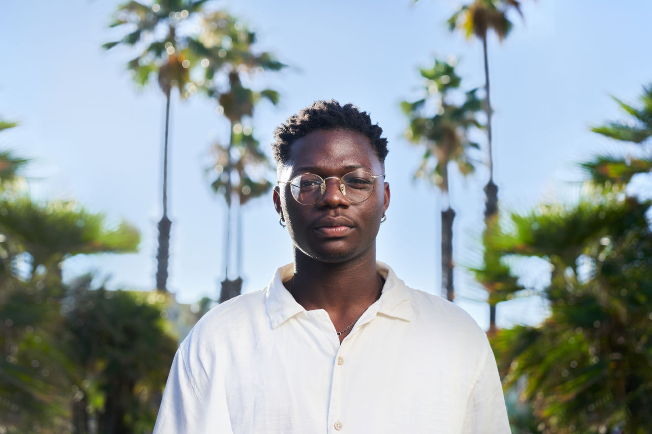 Portrait of handsome African American young man looking at camera serious. Concept of black live matter.